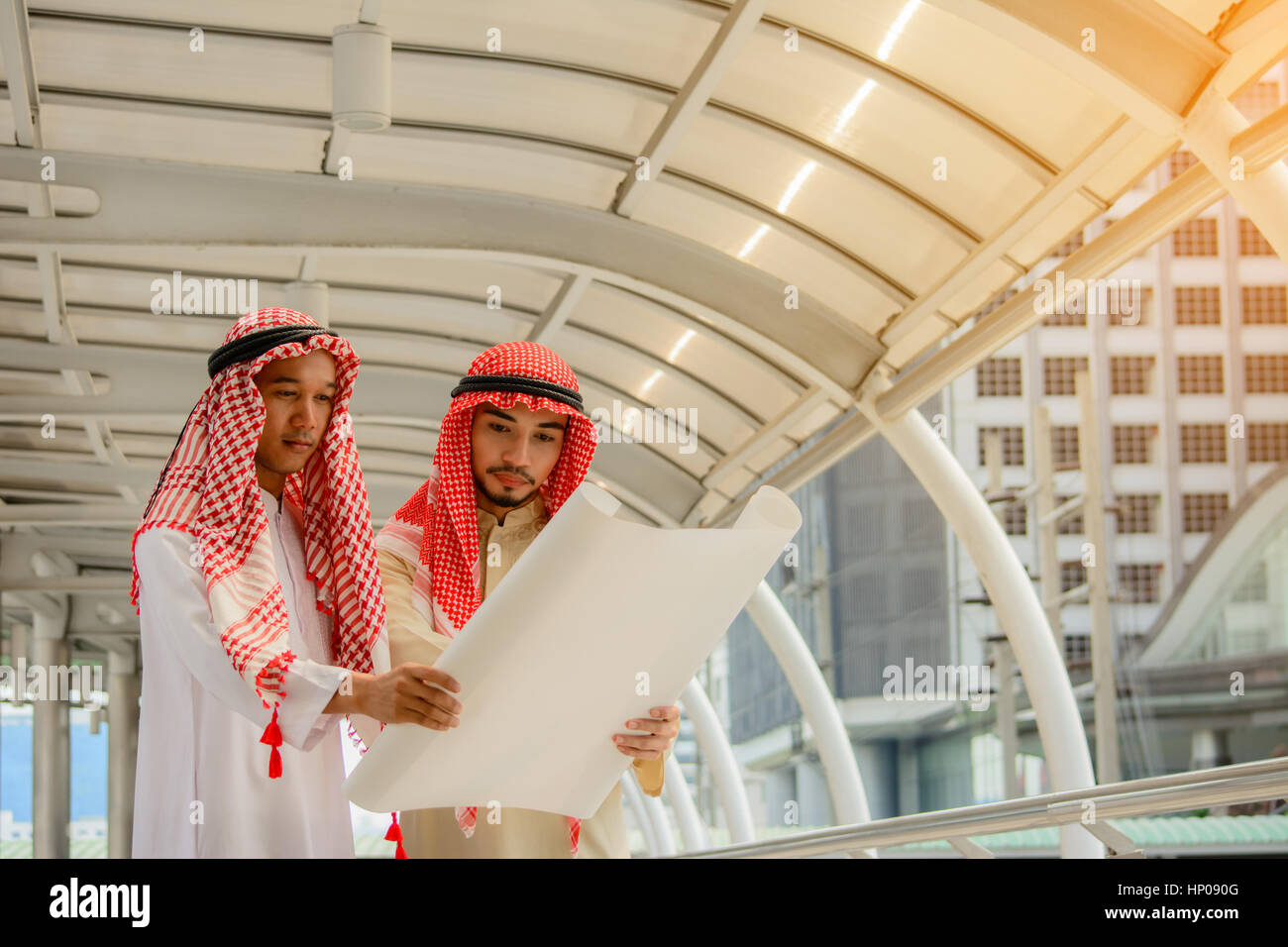 Arab Business people having consultanting about new project with city background. Stock Photo