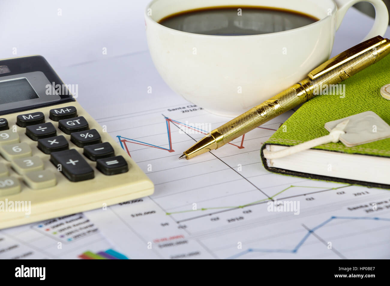 A cup coffee with finance chart Stock Photo Alamy
