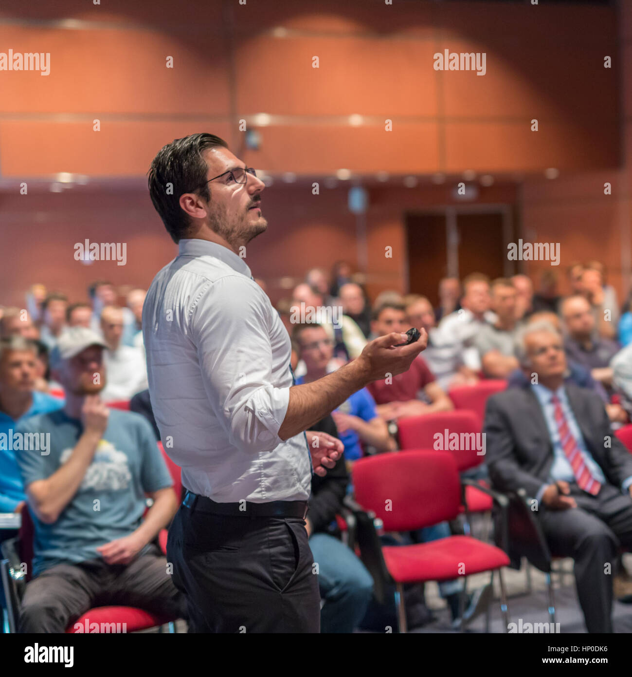 Public speaker giving talk at Business Event Stock Photo - Alamy