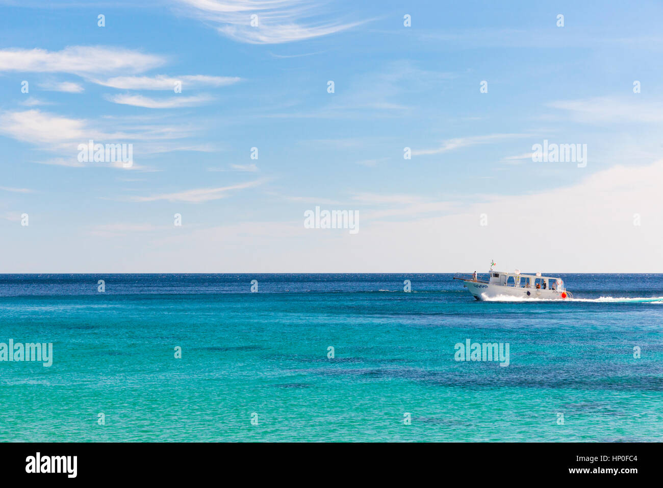 White tourist boat on the Mediterranean sea Stock Photo