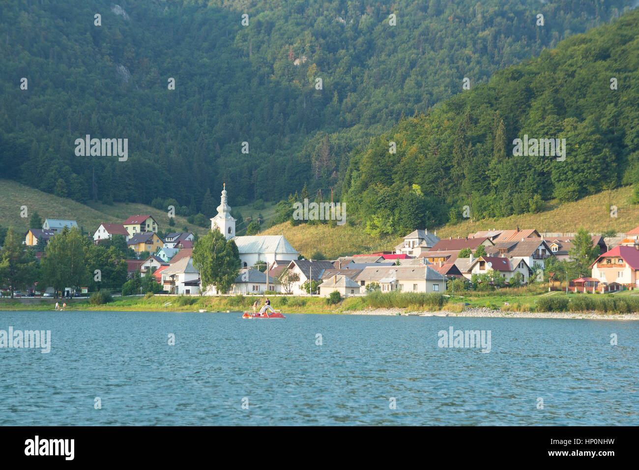small village with lake and forest Stock Photo