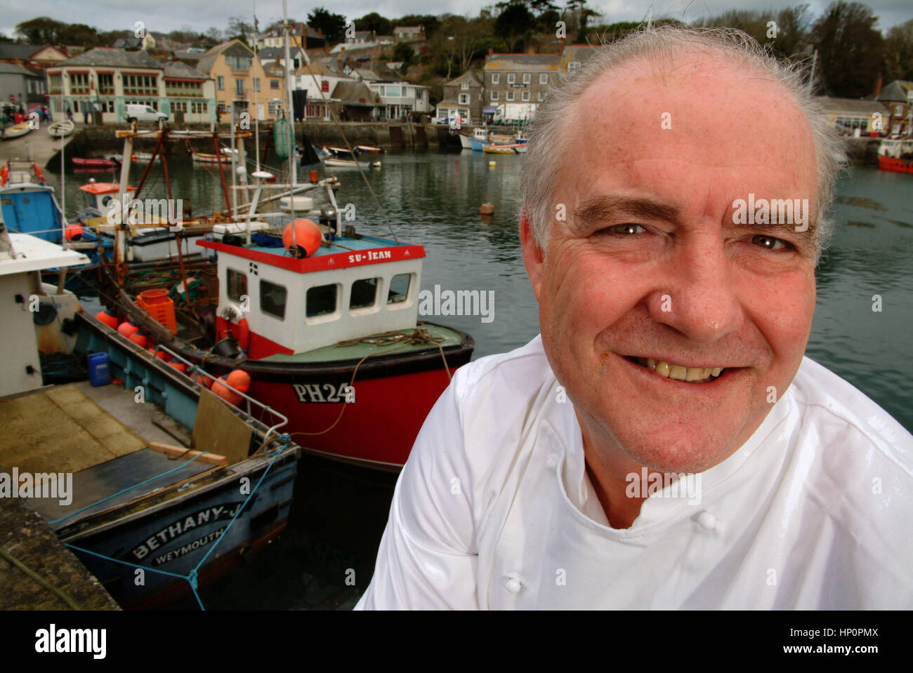 Chef and restaurant owner Rick Stein in Padstow harbour, Cornwall, UK Stock Photo