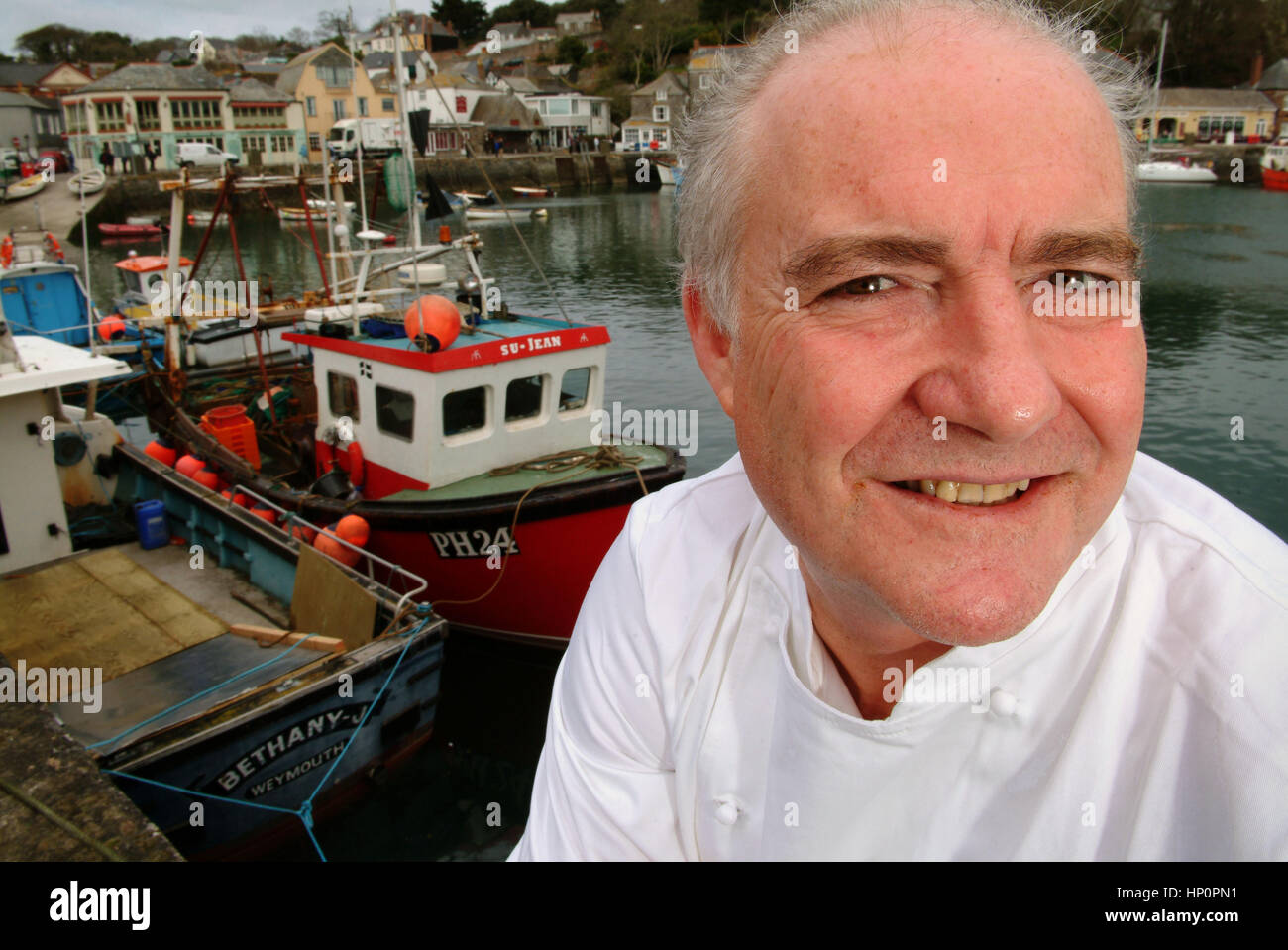 Chef and restaurant owner Rick Stein in Padstow harbour, Cornwall, UK