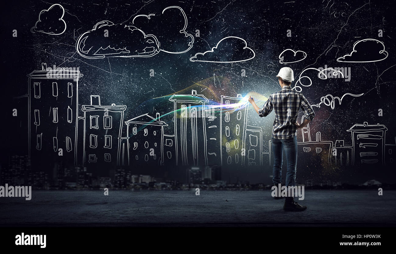 Rear view of engineer woman drawing construction plan Stock Photo - Alamy