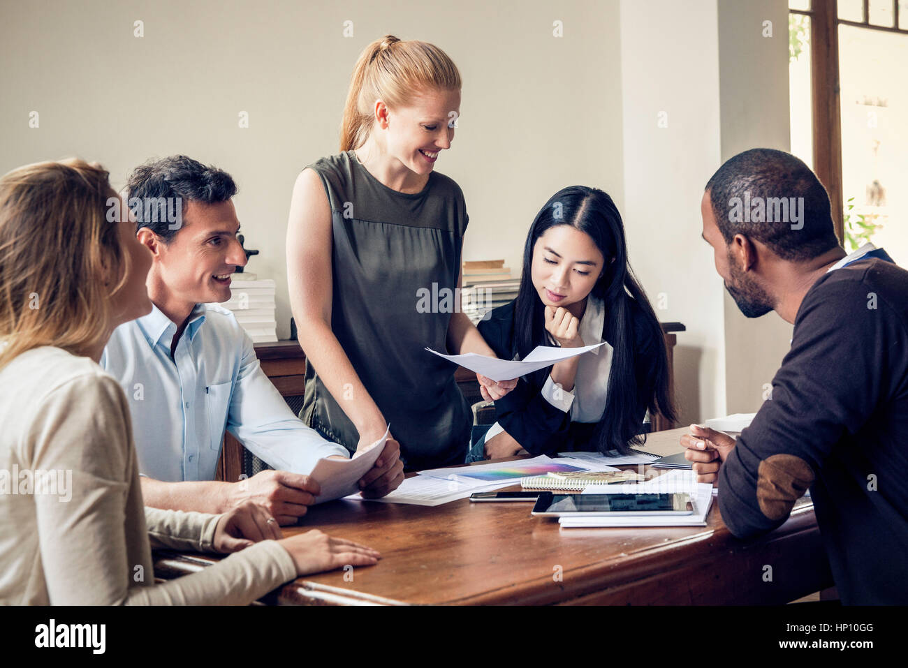 Colleagues meeting in casual office Stock Photo