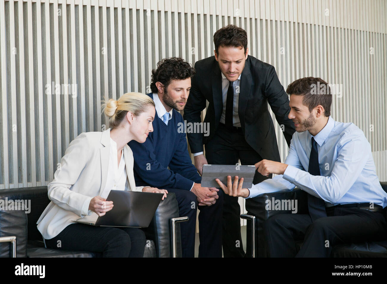 Business team members collaborating Stock Photo