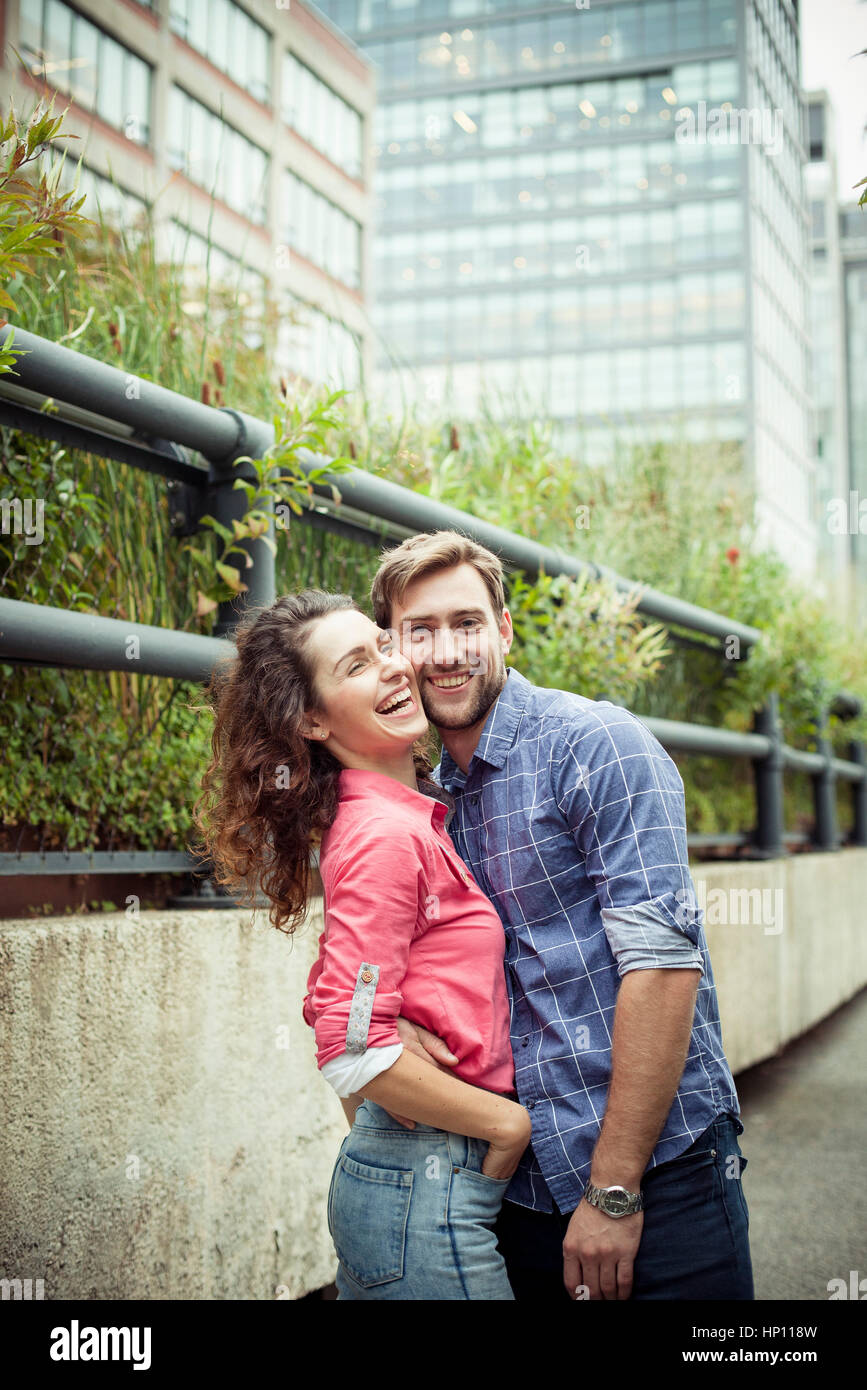 Affectionate couple outdoors, portrait Stock Photo
