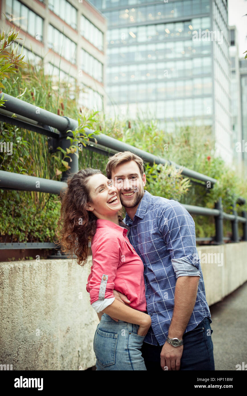 Arms around waists hi-res stock photography and images - Alamy