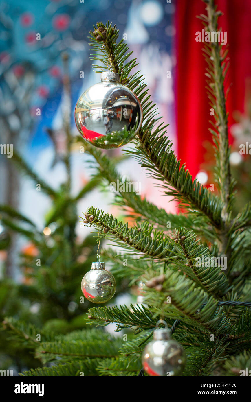 Ornaments hanging on christmas tree Stock Photo Alamy