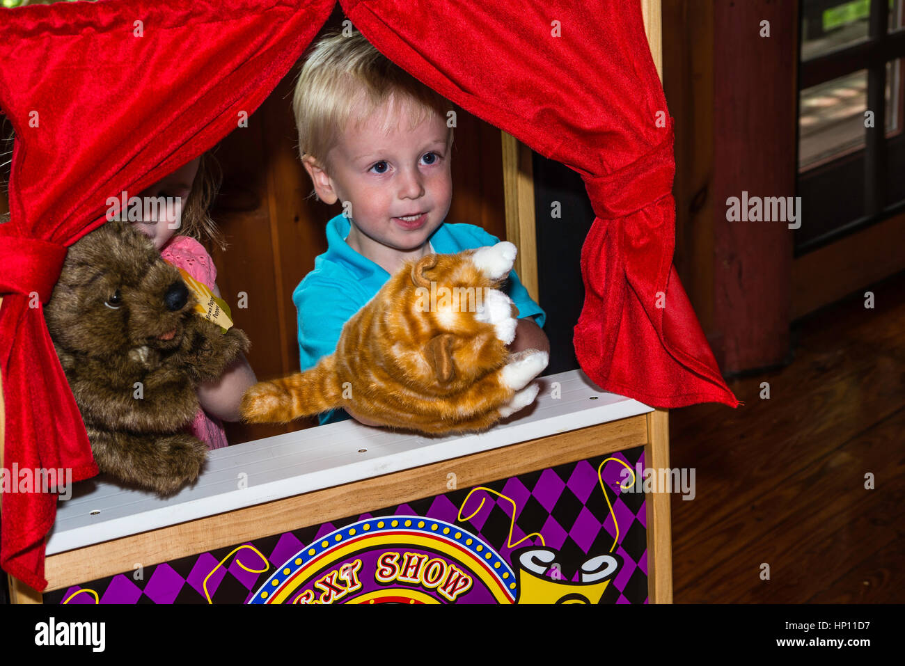 Children playing in puppet theater Stock Photo Alamy