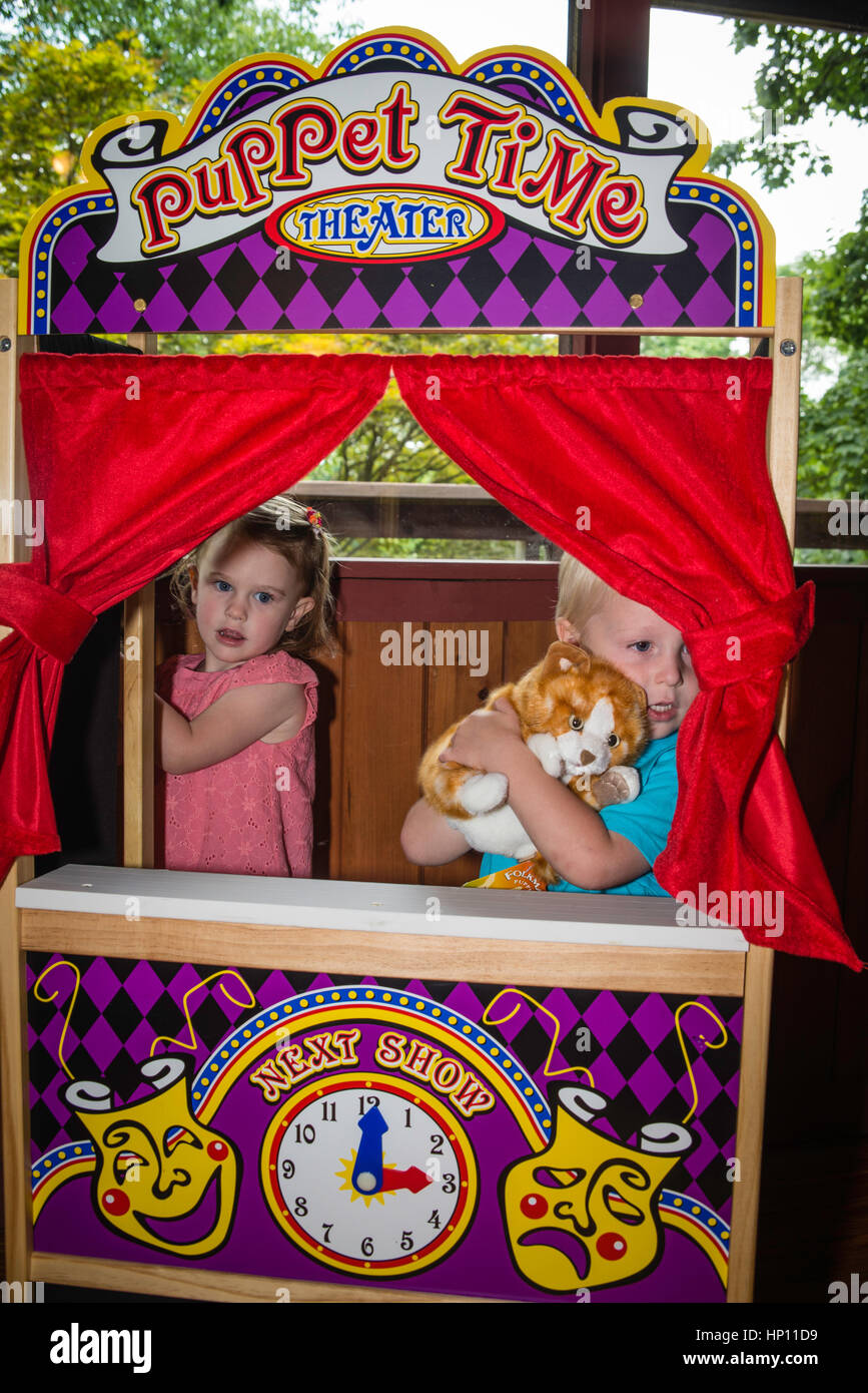 Children playing in puppet theater Stock Photo Alamy