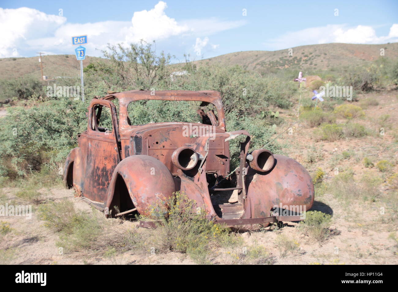 This is a rusted out antique vintage 2 door car Stock Photo