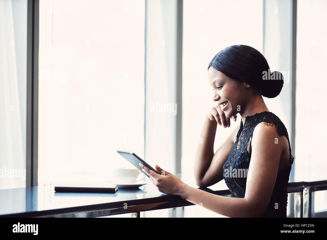 African woman smiling hi-res stock photography and images - Alamy