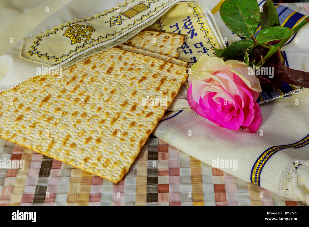 Jewish holiday, Holiday symbol, jewish matzo bread on a table with flowers Stock Photo