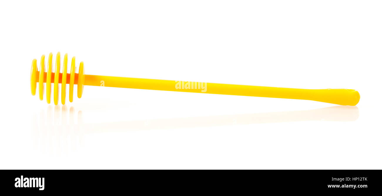 plastic honey dipper isolated on white background Stock Photo Alamy