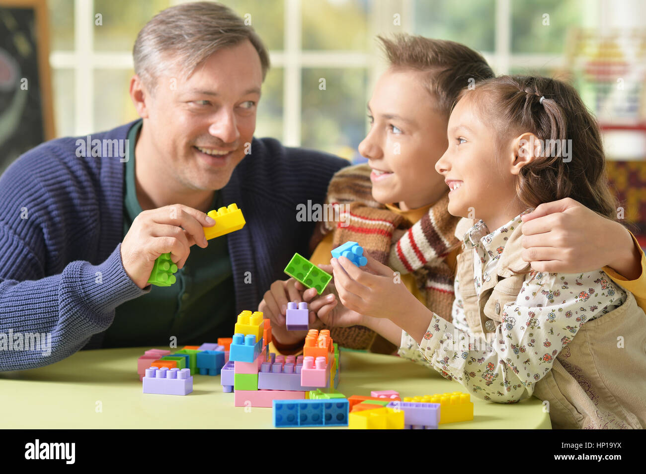 family playing constructor Stock Photo