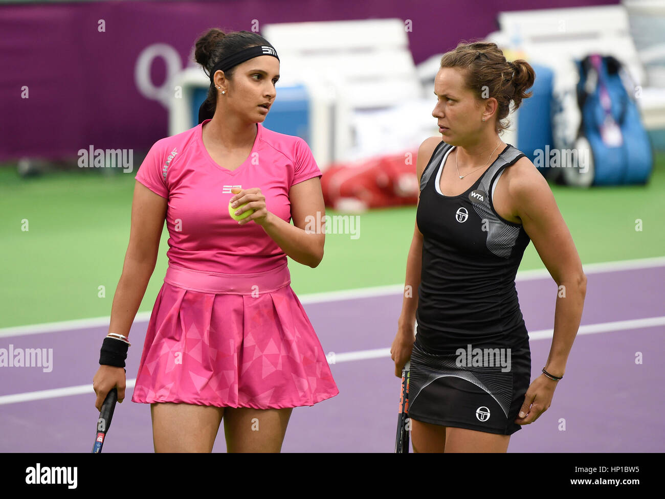 Doha, Qatar. 16th Feb, 2017. Sania Mirza (L) of India and Barbora Strycova  of Czech Republic communicate during the women's doubles 1st round match  against Xu Yifan of China and Raquel Atawo