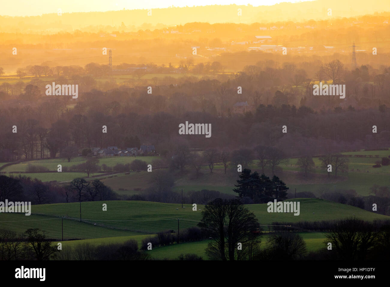 A golden sunrise over rural Flintshire near to the village of Rhosesmor Stock Photo