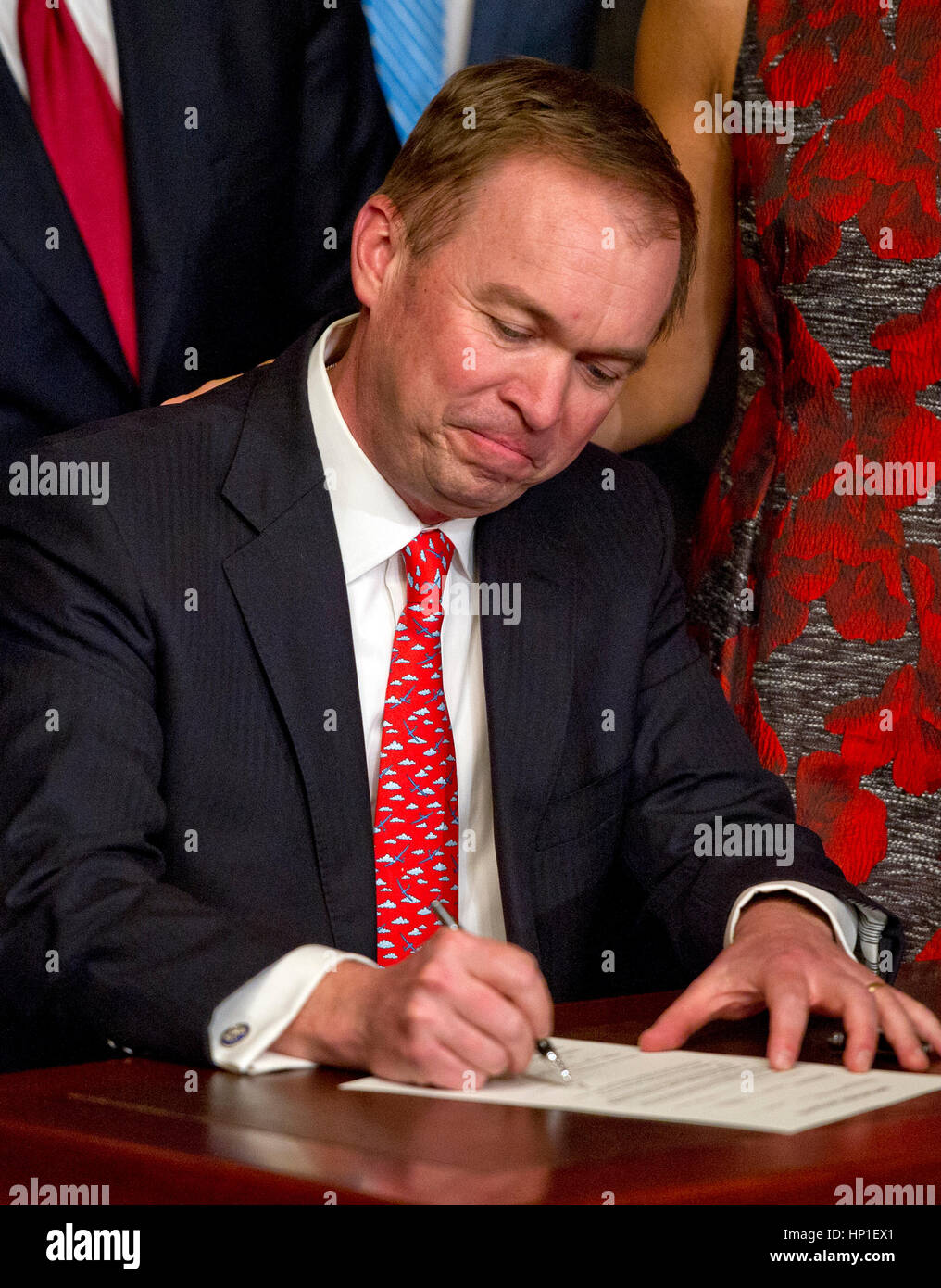 Washington, USA. 16th Feb, 2017. Former United States Representative Mick Mulvaney (Republican of South Carolina) signs the signs the affidavit of appointment after being sworn-in to be Director of the Office of Management and Budget (OMB) by US Vice President Mike Pence in the Vice President's Ceremonial Office at the White House in Washington, DC on Thursday, February 16, 2017. Credit: Ron Sachs/Pool via CNP Foto: Ron Sachs/Consolidated/dpa/Alamy Live News Stock Photo