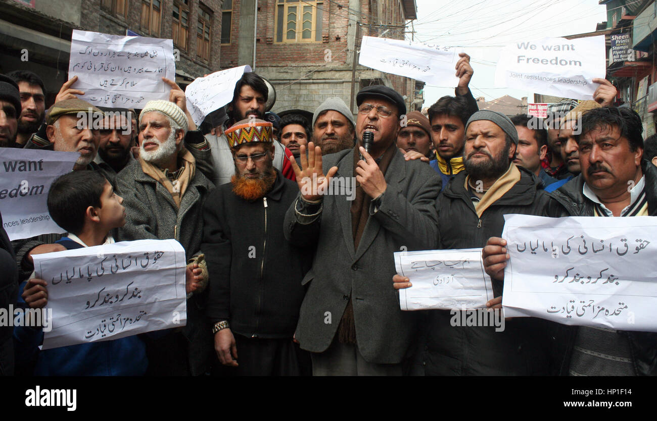 Srinagar, Indian Administered Kashmir. 17th February 2017.Supporters pf Jammu& Kashmir Liberatio Front (JKLF) holds play cards ,after prayers .Expressing disappointment over the remarks of the Army Chief General Bipin Rawat.against civilians who indulge in stone pelting during counterinsurgency operations in Kashmir would be treated as anti-nationals and dealt with accordingly.Recently in Bandipora, stone-pelters attacked soldiers when they were about to launch an operation against terrorists holed up in a house. Credit: sofi suhail/Alamy Live News Stock Photo