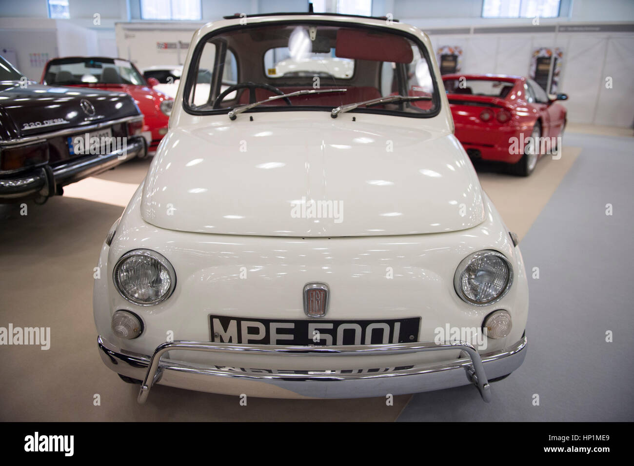 Olympia, London, UK. 17th Feb, 2017. Historic automobile fair and auction preview day. Historic ultra-luxury cars available for private owners and collectors looking to invest in a variety of cars with a COYS auction on Saturday 18th February. Photo: 1972 Fiat 500L, estimate £9,000-£12,000. Credit: Malcolm Park editorial/Alamy Live News Stock Photo