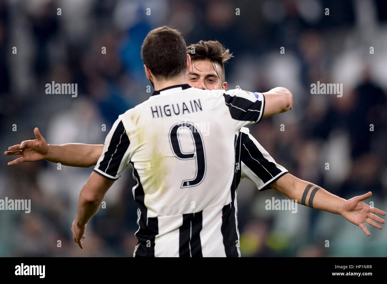 Turin, Italy. 17 February, 2017. Paulo Dybala (right) of Juventus FC celebrates with Gonzalo Higuain after scoring a goal during the Serie A football match between Juventus FC and US Citta di Palermo. Credit: Nicolò Campo/Alamy Live News Stock Photo
