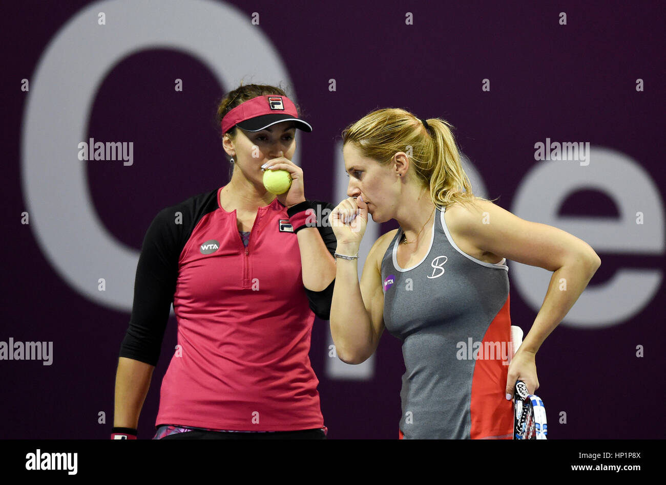 Doha, Qatar. 17th Feb, 2017. Olga Savchuk (R) of Ukraine and Yaroslava Shvedova of Kazakhstan communicate during the women's doubles quarterfinal match against Peng Shuai of China and Andrea Hlavackova of the Czech Republic at WTA Qatar Open 2017 in Doha, Qatar, Feb. 17, 2017. Savchuk and Shvedova won 2-1. Credit: Nikku/Xinhua/Alamy Live News Stock Photo
