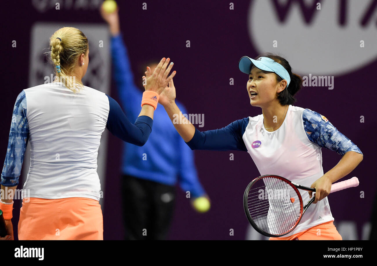 Doha, Qatar. 17th Feb, 2017. Peng Shuai (R) of China and Andrea Hlavackova of the Czech Republic celebrates during the women's doubles quarterfinal match against Olga Savchuk of Ukraine and Yaroslava Shvedova of Kazakhstan at WTA Qatar Open 2017 in Doha, Qatar, Feb. 17, 2017. Savchuk and Shvedova won 2-1. Credit: Nikku/Xinhua/Alamy Live News Stock Photo