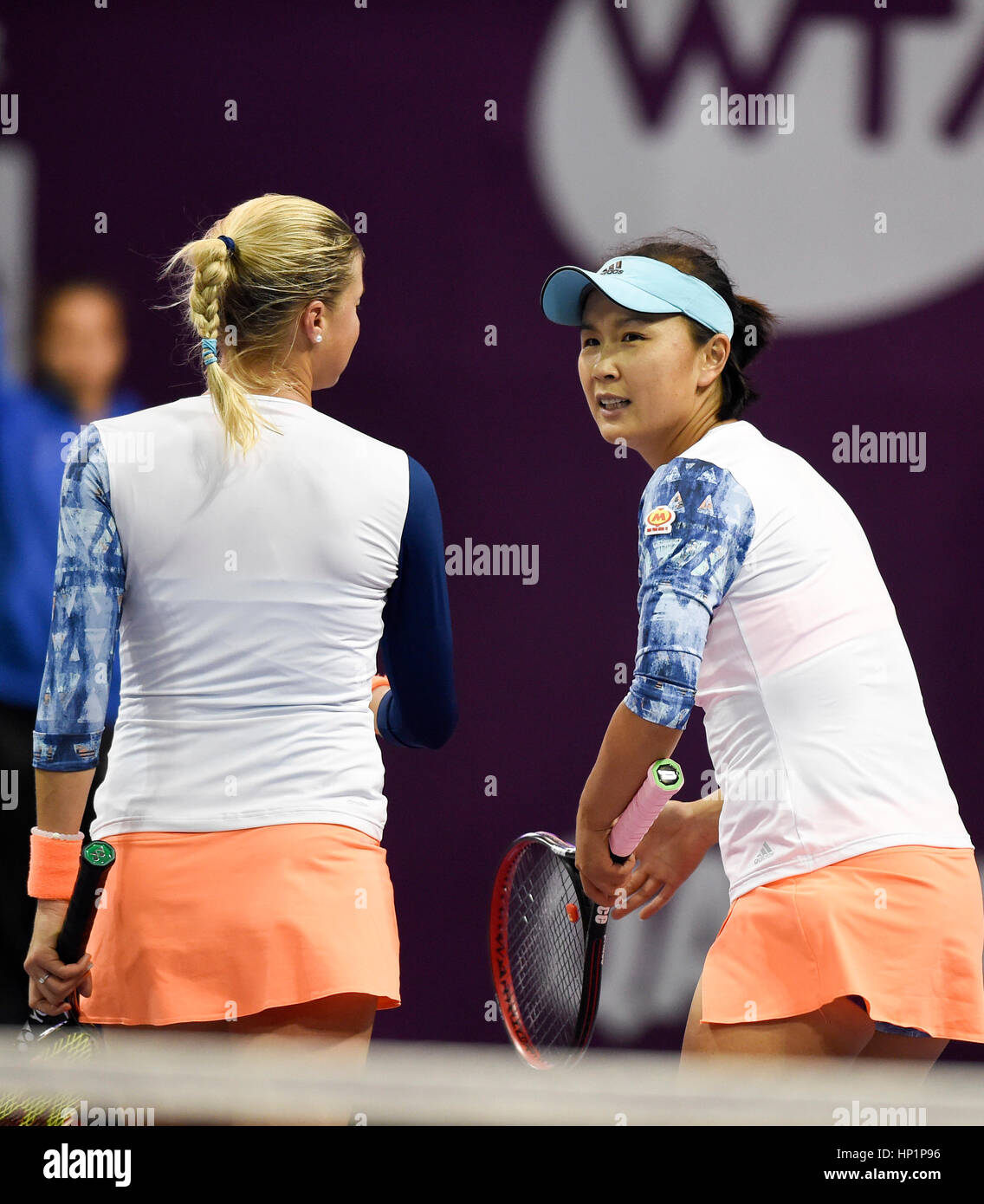 Doha, Qatar. 17th Feb, 2017. Peng Shuai (R) of China and Andrea Hlavackova of the Czech Republic communicate during the women's doubles quarterfinal match against Olga Savchuk of Ukraine and Yaroslava Shvedova of Kazakhstan at WTA Qatar Open 2017 in Doha, Qatar, Feb. 17, 2017. Savchuk and Shvedova won 2-1. Credit: Nikku/Xinhua/Alamy Live News Stock Photo