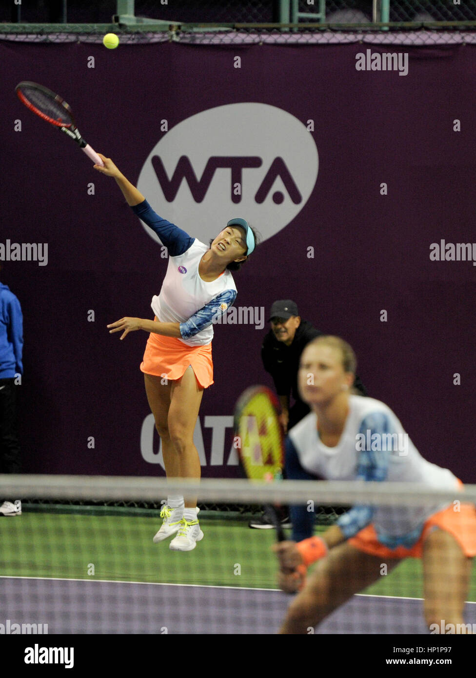 Doha, Qatar. 17th Feb, 2017. Peng Shuai (back) of China and Andrea Hlavackova of the Czech Republic compete during the women's doubles quarterfinal match against Olga Savchuk of Ukraine and Yaroslava Shvedova of Kazakhstan at WTA Qatar Open 2017 in Doha, Qatar, Feb. 17, 2017. Savchuk and Shvedova won 2-1. Credit: Nikku/Xinhua/Alamy Live News Stock Photo