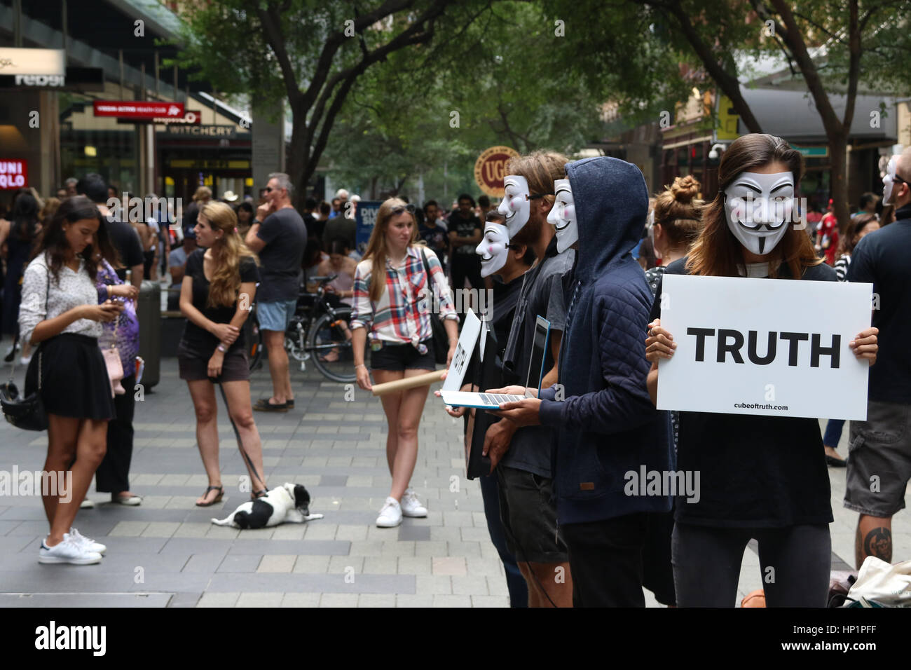 Sydney, Australia. 18 February 2017. ‘A group of Vegans held a silent protest in Pitt Street Mall, wearing anonymous ‘Guy Fawkes’ ‘ masks. Some held placards with the word ‘truth’ whilst others held screens appearing to show animal cruelty. Credit: © Richard Milnes/Alamy Live News Stock Photo