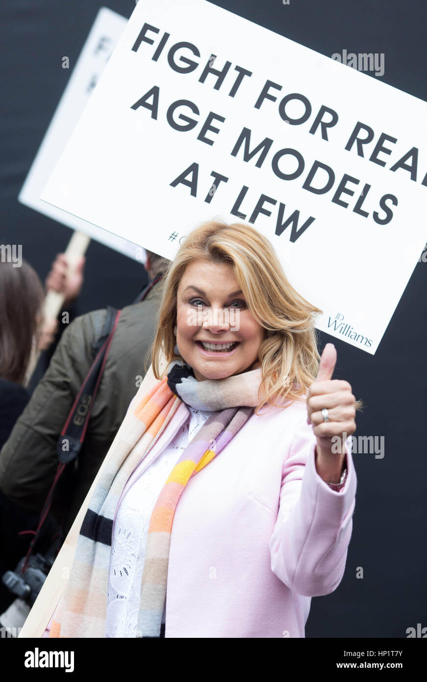 EDITORIAL USE ONLY Jilly Johnson, 63, takes part in a mature models protest on the Strand in London, as retailer JD Williams demonstrates against ageism at London Fashion Week. Stock Photo