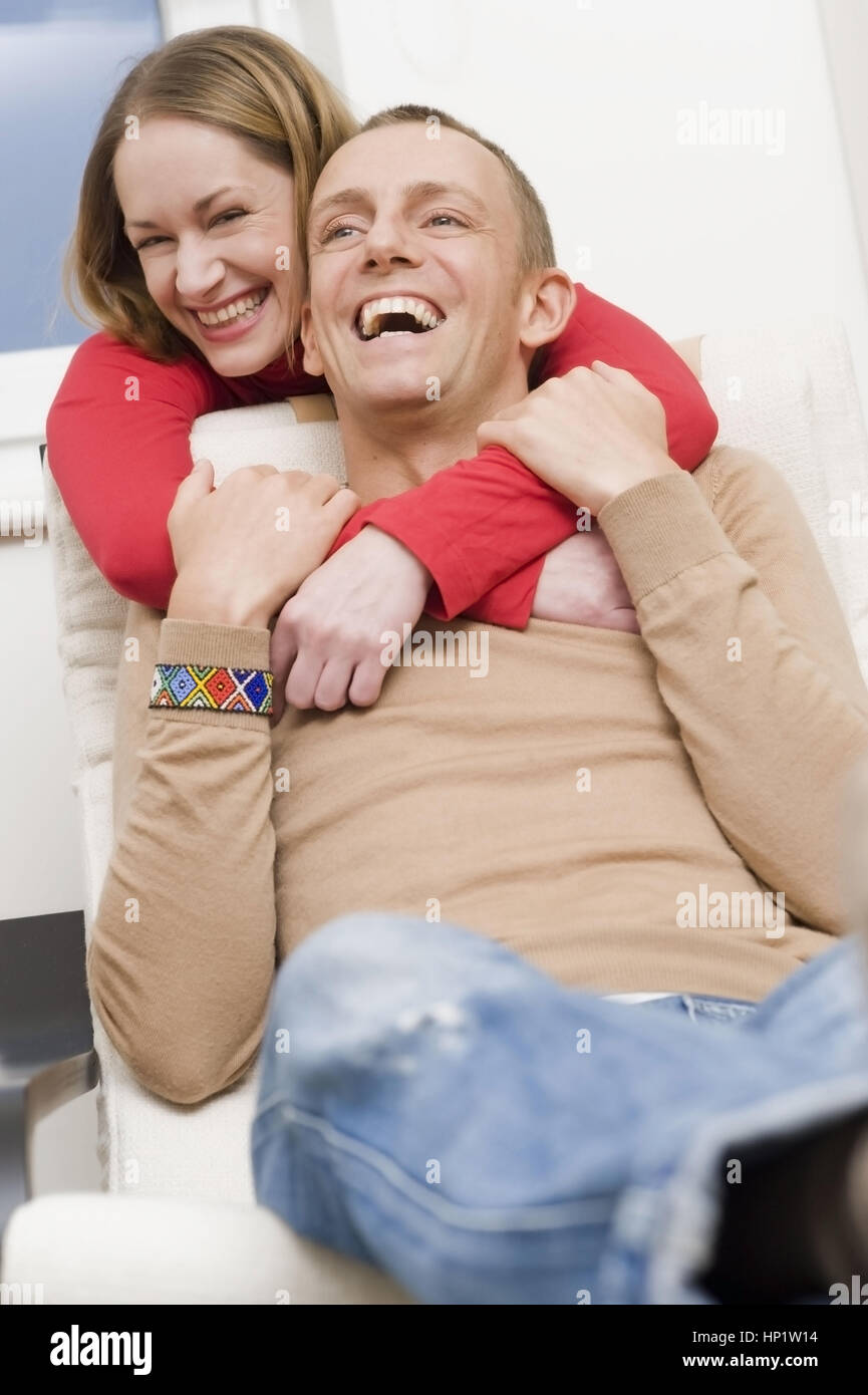 Model release , Froehliches, junges Paar Zuhause - lucky, young couple at home Stock Photo