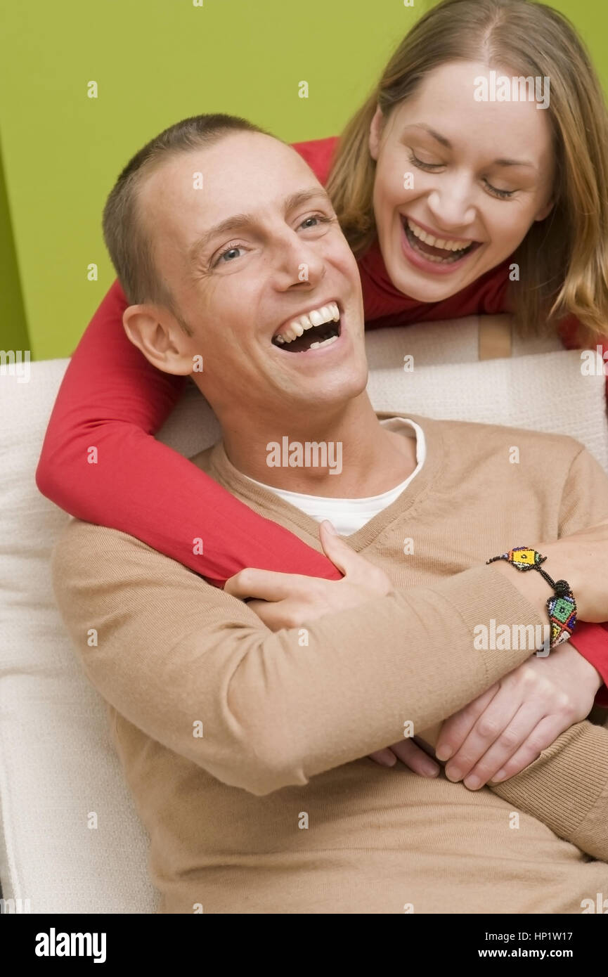 Model release , Froehliches, junges Paar Zuhause - lucky, young couple at home Stock Photo