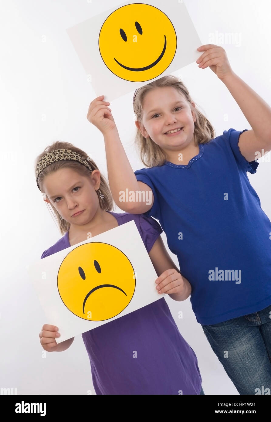 Model release , Trauriges und froehliches Kind, Symbolbild - sad an happy children, symbolic Stock Photo
