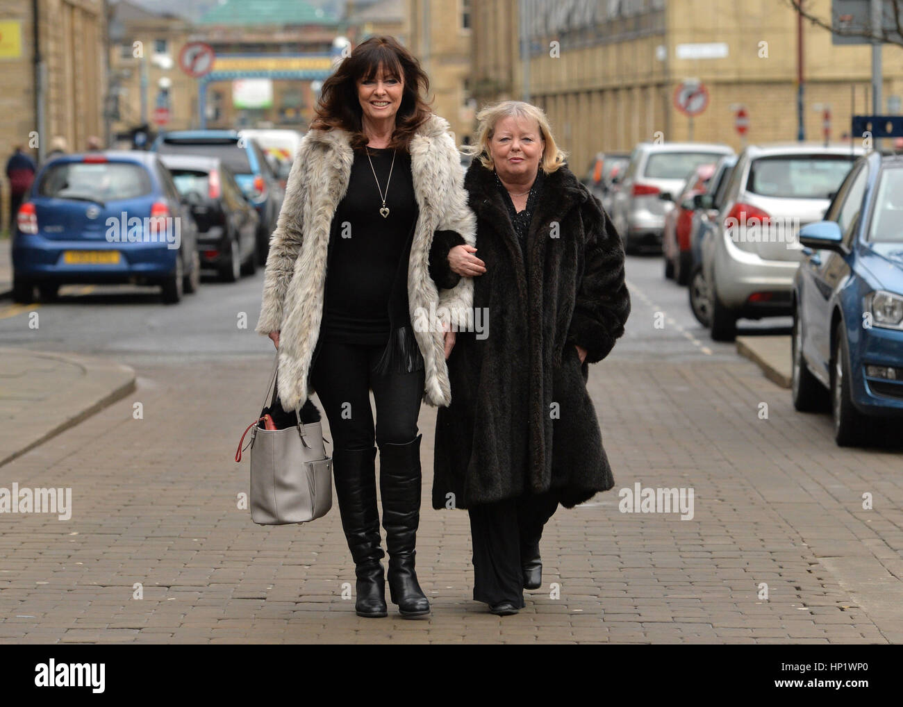 Actresses Vicki Michelle (left) and Sue Hodge arrive for the funeral of 'Allo 'Allo star Gordon Kaye at Huddersfield Parish Church. Stock Photo