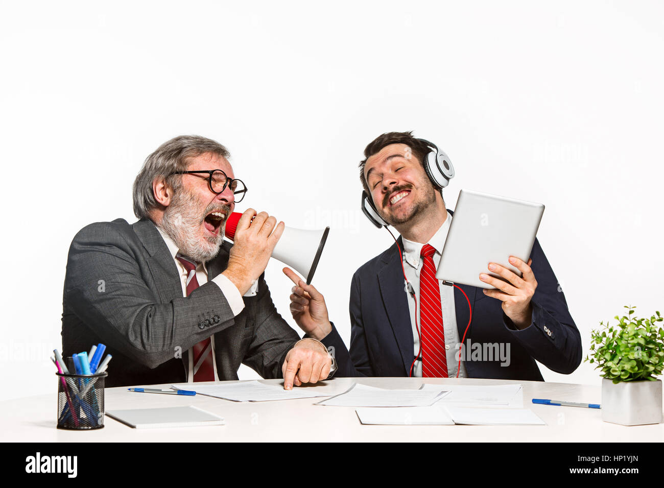 Two Team Members The two colleagues working together at office on white background Stock ...