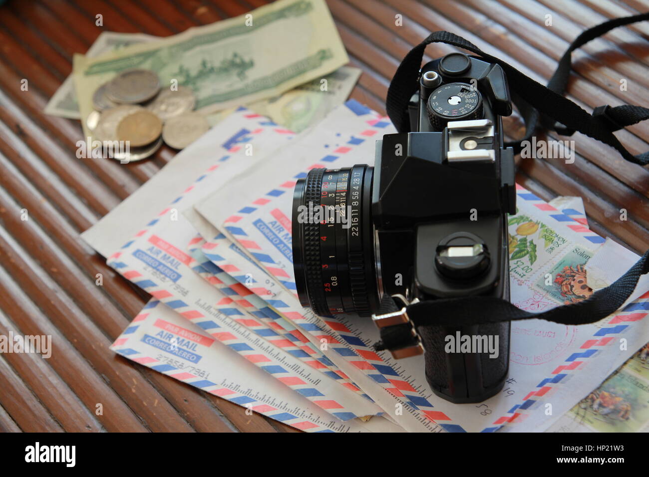 Film camera on stack of air mail letters Stock Photo Alamy