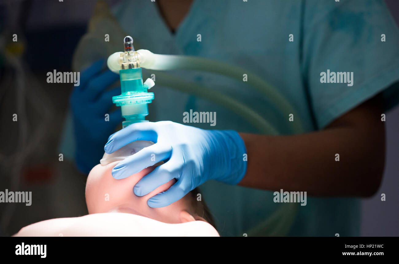 anesthesiologist gives the mask inhalation anesthesia Stock Photo Alamy