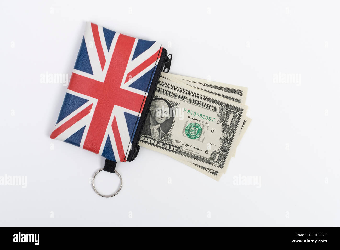 Union Jack coin purse with US 1$ / one dollar bills / banknotes - as metaphor for US Dollar-Sterling exchange rate, holiday spending money in US Stock Photo