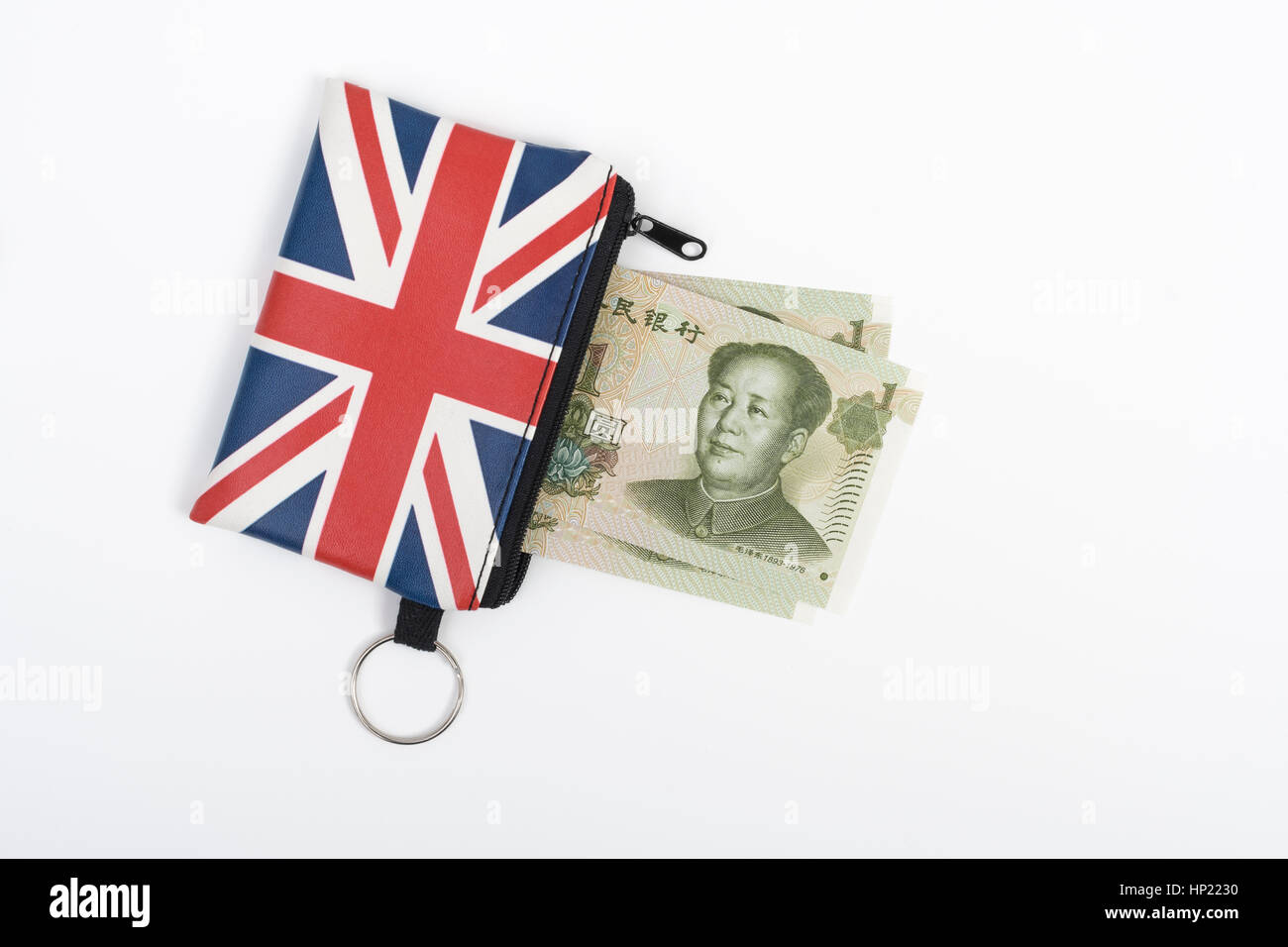 Union Jack coin purse with Chinese 1 Yuan banknotes - as metaphor for Yuan / Renminbi-Sterling exchange rate. Stock Photo