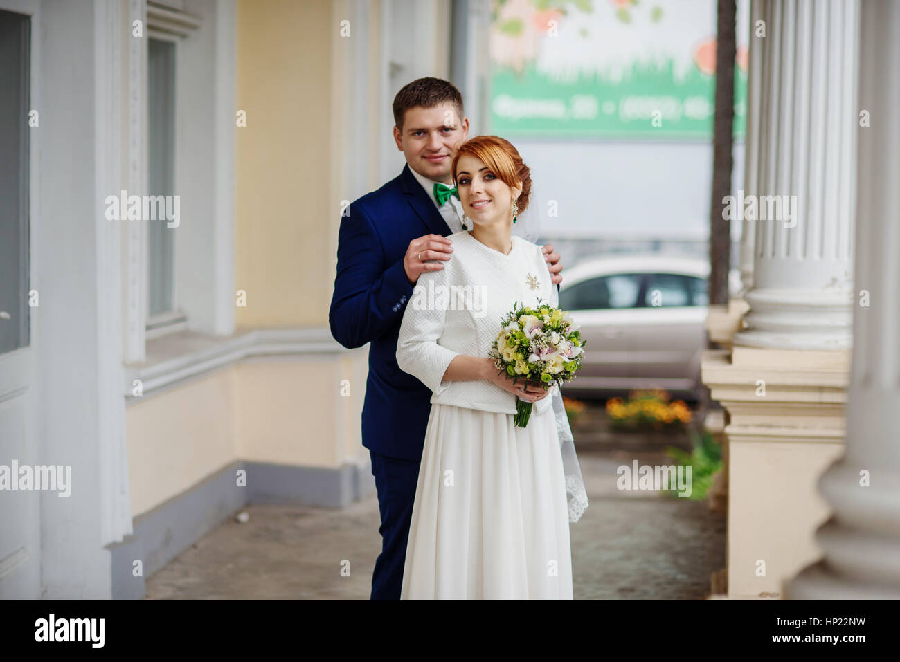 Wedding couple in love background large columns of antique house Stock ...