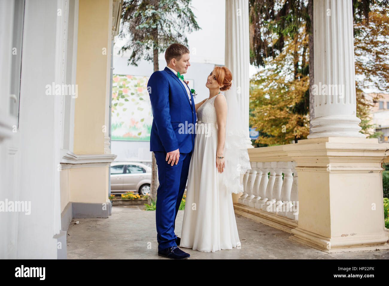 Wedding couple in love background large columns of antique house Stock ...