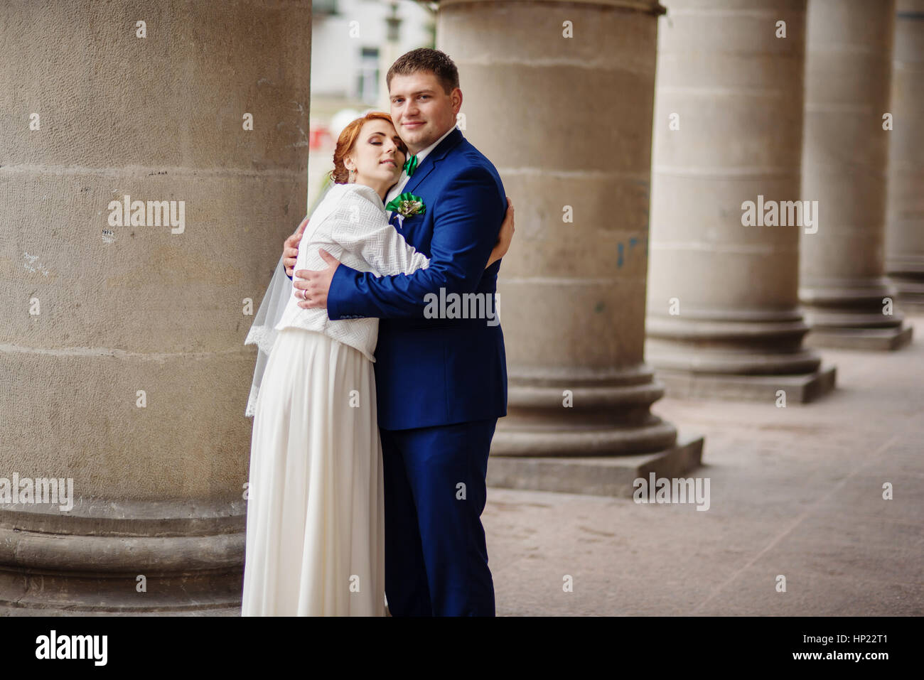 Wedding couple in love background large columns of antique house Stock ...