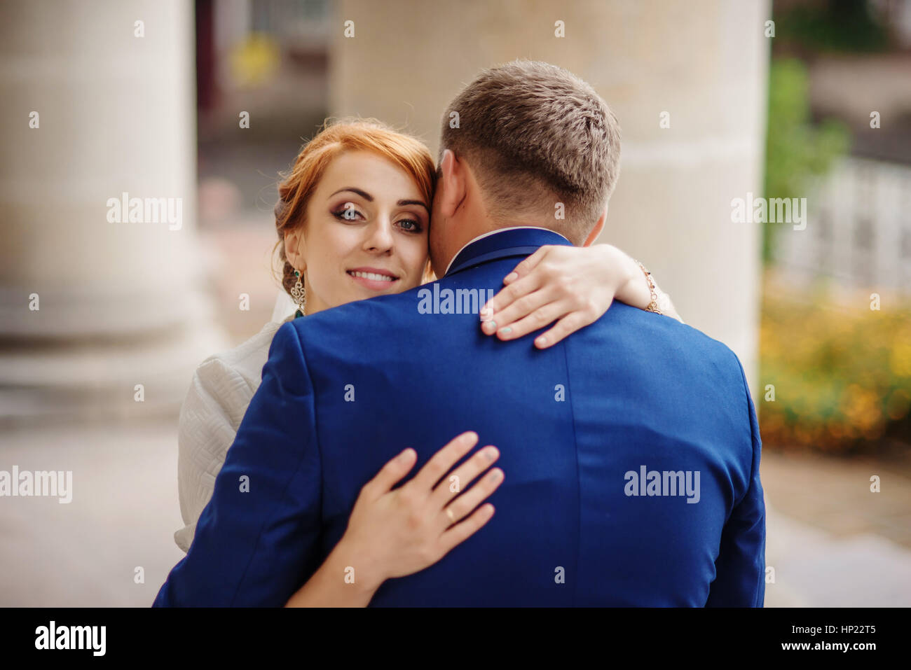 Wedding couple in love background large columns of antique house Stock ...