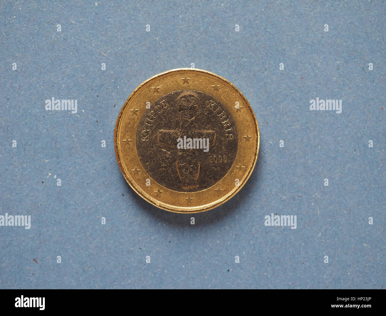 1 euro coin money (EUR), currency of European Union, Cyprus over blue background Stock Photo