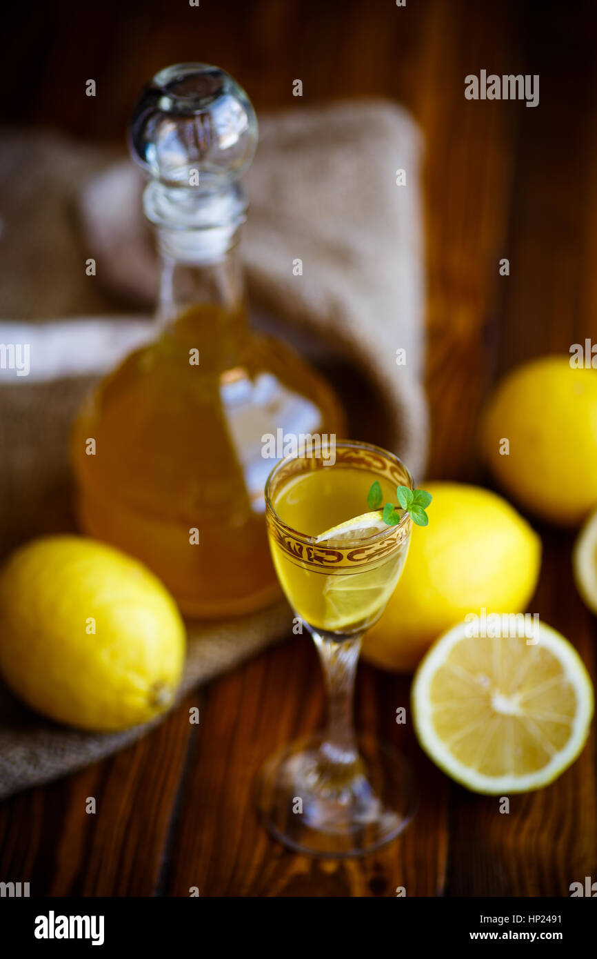 sweet lemon alcoholic brandy in the decanter Stock Photo Alamy
