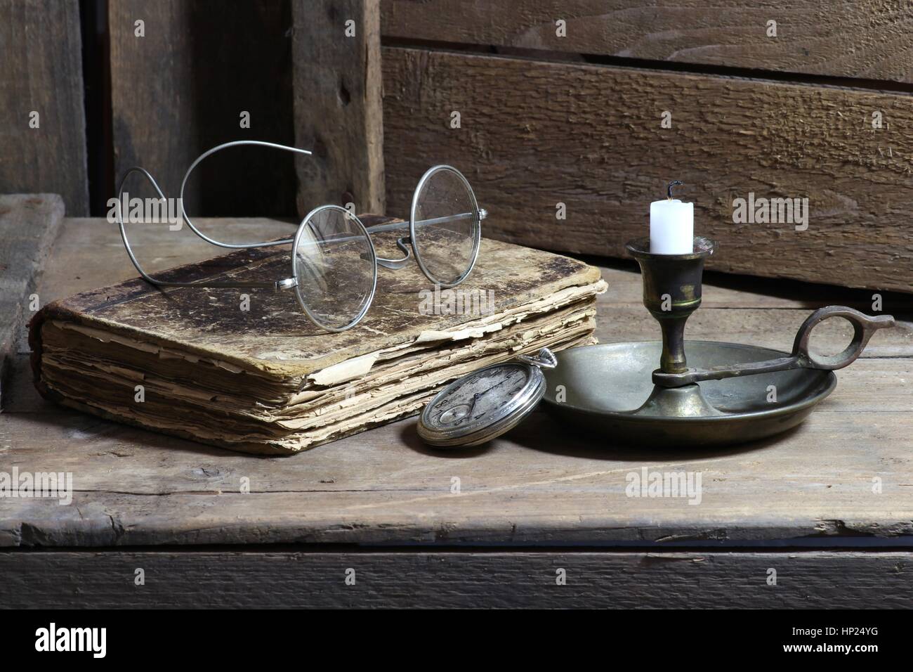 antique book with accessories on wooden background Stock Photo