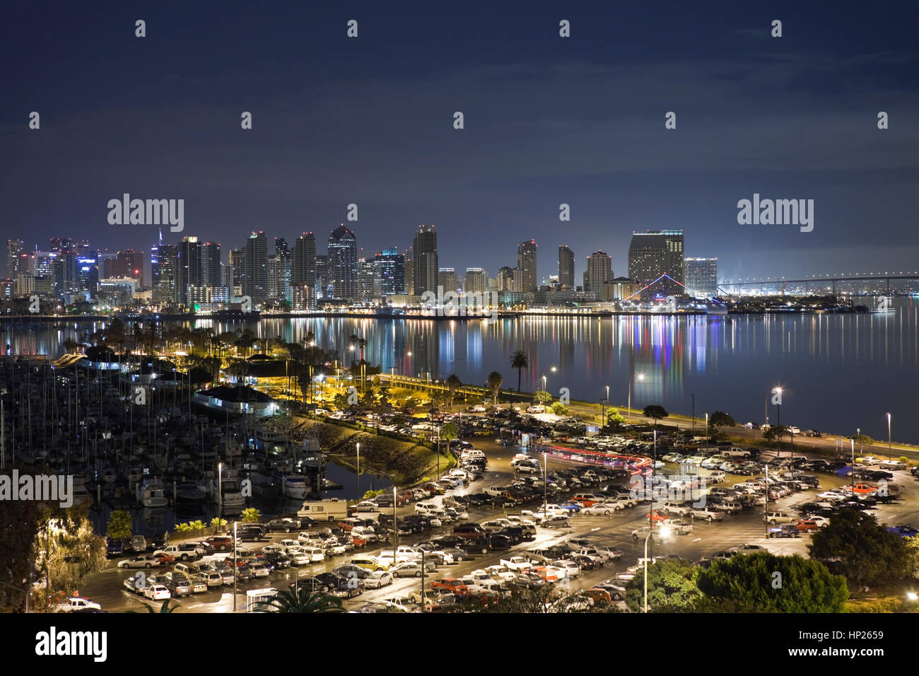 San Diego, California, USA - March 24, 2011:  San Diego bay and downtown towers glow brightly at night. Stock Photo