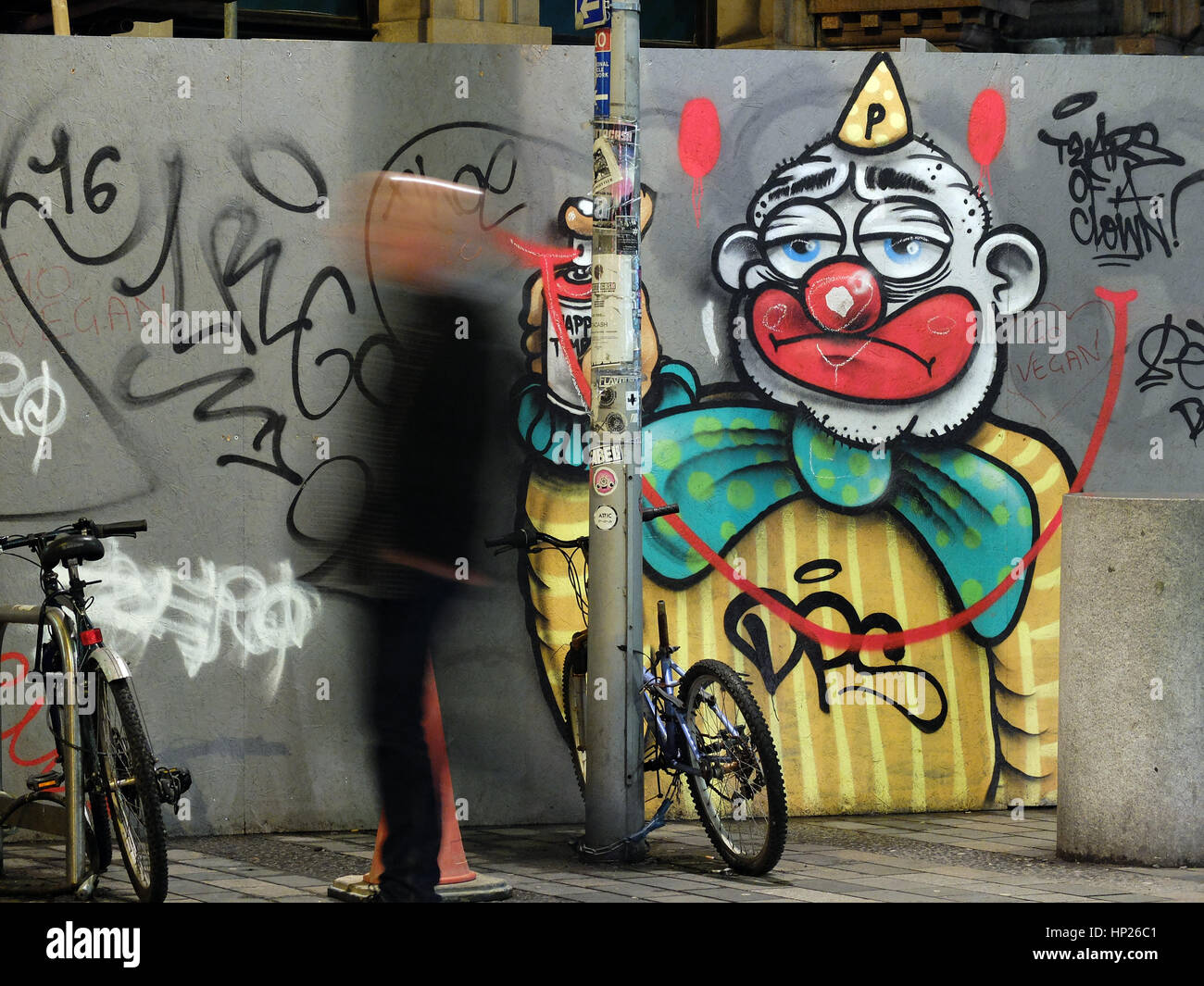 Urban graffiti, sad clown in Brighton. Stock Photo